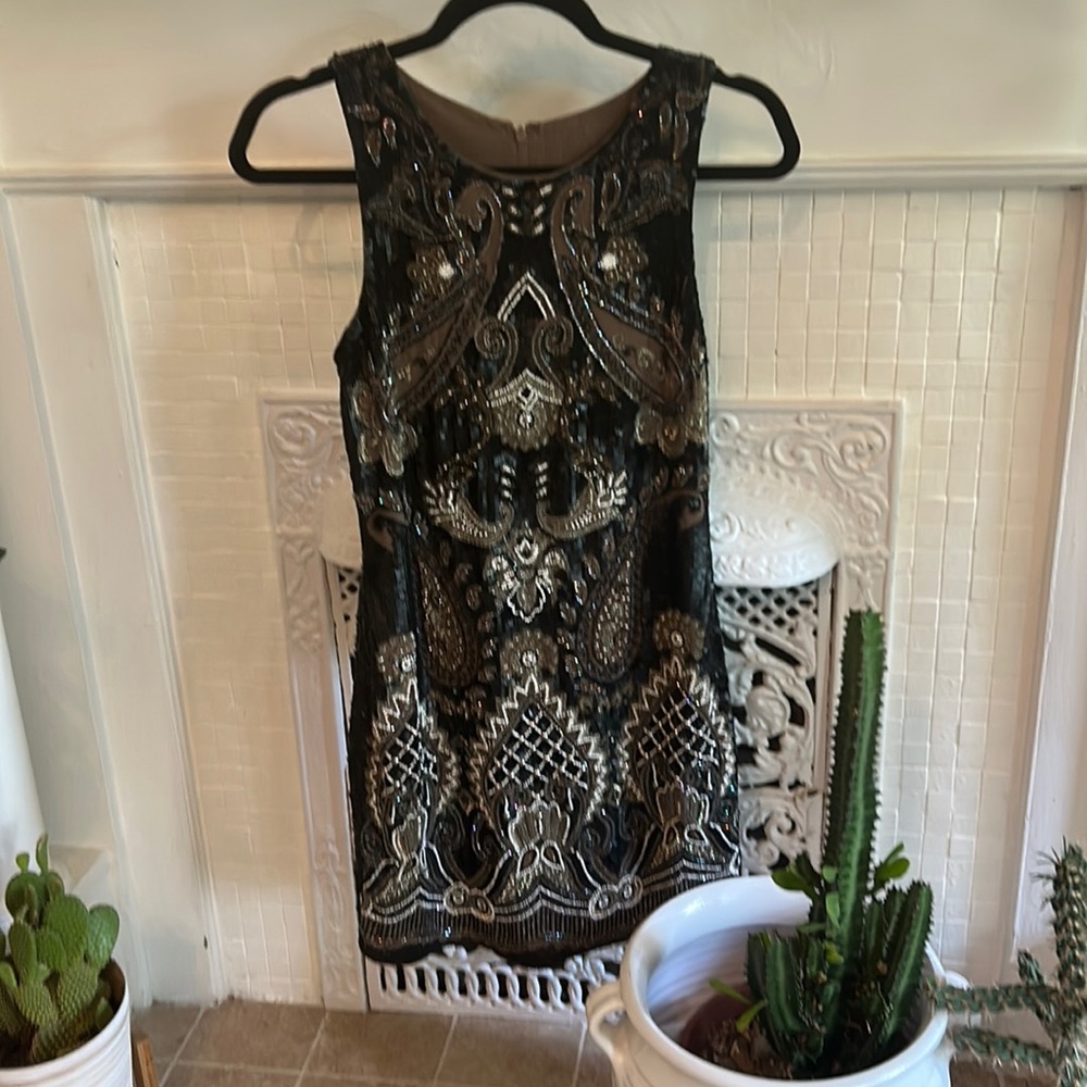 Needle and Thread. Stunning detail and stunning fit, all beaded